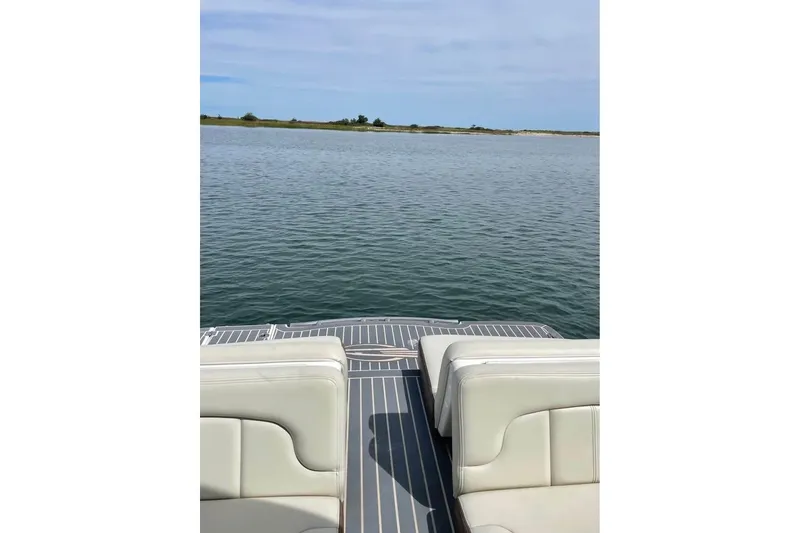 Slide: The Image of 2017 Chaparral 257 SSX boat interior with water view in the background. - 3