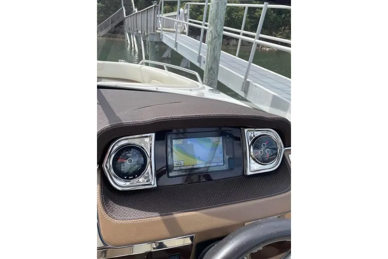 Slide: The Image of Dashboard of a 2017 Chaparral 257 SSX boat with navigation display. - 5