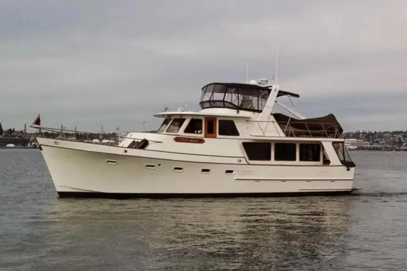 The Image of 1982 Ocean Alexander 50 Mark I yacht cruising on calm waters. - 1