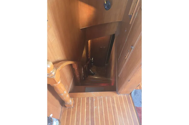 Slide: The Image of Wooden staircase inside 1982 Ocean Alexander 50 Mark I yacht. - 15
