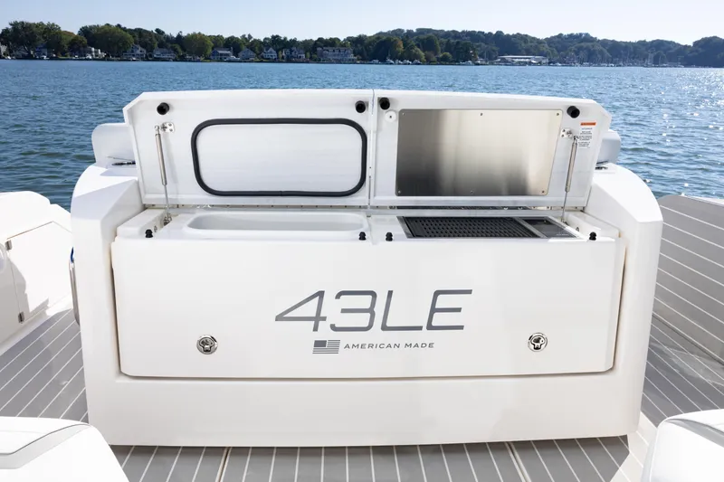 Slide: The Image of 2025 Tiara Yachts 43 LE boat, open storage, lake view, American-made. - 16