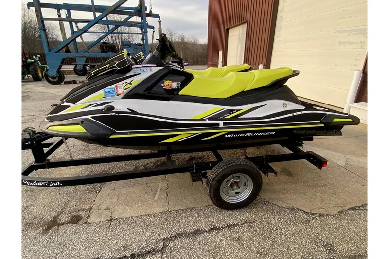 Slide: The Image of 2021 Yamaha WaveRunner VX-C jet ski on trailer, featuring vibrant yellow and black design. - 8