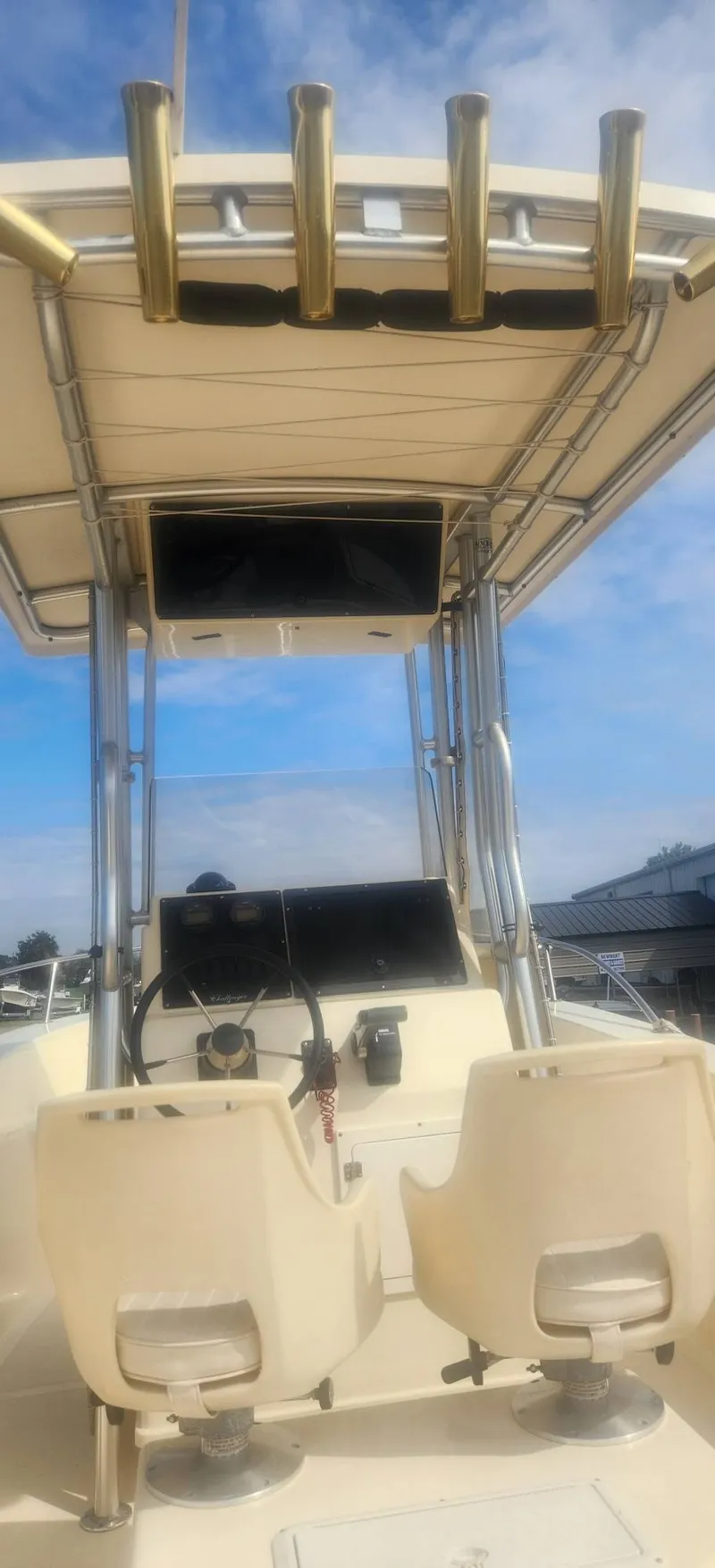 Slide: The Image of 2003 KenCraft Challenger 206 boat cockpit with helm station. - 3