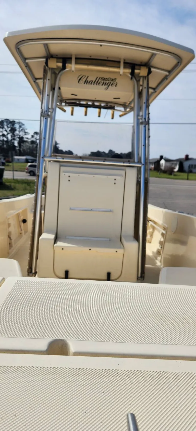 Slide: The Image of 2003 KenCraft Challenger 206 boat with T-top and seating area. - 8