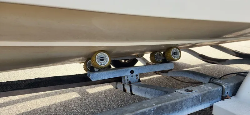 Slide: The Image of Underside of a 2003 KenCraft Challenger 206 boat on a trailer. - 9