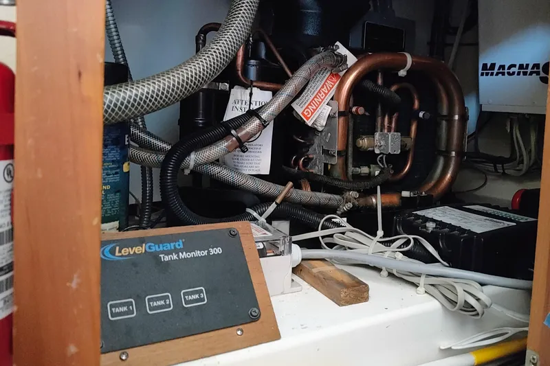 Slide: The Image of LevelGuard Tank Monitor 300. Situated in lower galley cabinet, - 32