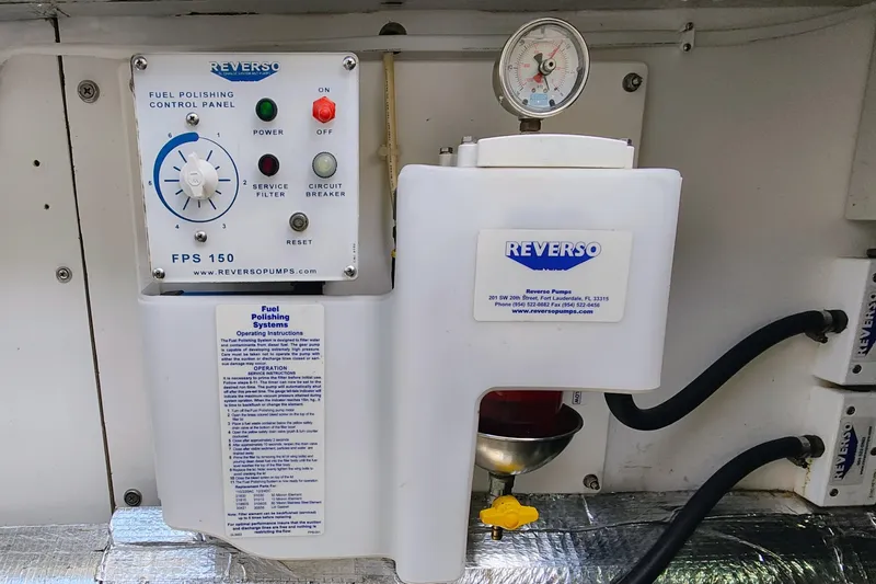 Slide: The Image of Fuel polishing control panel on a 2009 Maine Cat P-47 boat. - 62