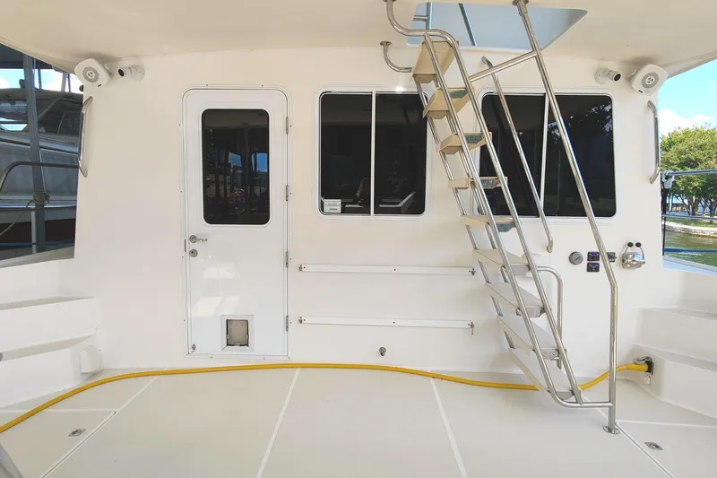 Slide: The Image of Boat control panel with Fusion audio knob, Volvo Penta EVC controls, and Side-Power thruster switch. - 7