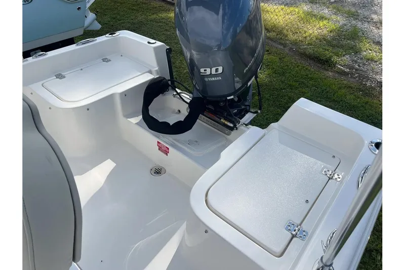 Slide: The Image of 2026 Key West 1720 Center Console boat with Yamaha 90 engine, white interior. - 11