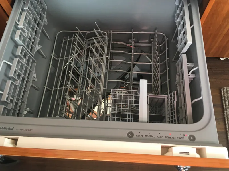 Slide: The Image of Open Fisher & Paykel DishDrawer in a 2016 Riviera 5000 Sport Yacht kitchen. - 24