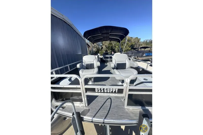 The Image of 2022 Lowe Ultra 182 Fish & Cruise pontoon boat with seating and canopy. - 1