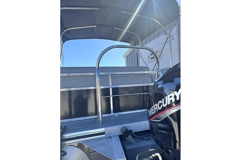 Slide: The Image of 2022 Lowe Ultra 182 Fish & Cruise boat with Mercury engine and canopy. - 3