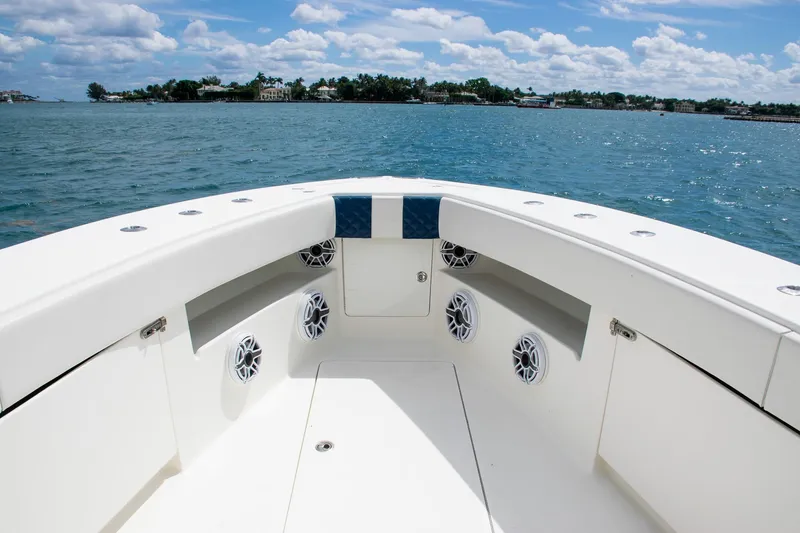 Slide: The Image of 2022 SeaVee 390Z boat interior with speakers, on a sunny day at sea. - 11