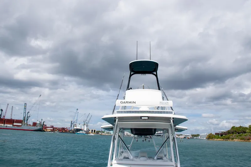 Slide: The Image of 2022 SeaVee 390Z boat with Garmin equipment on a cloudy day at the harbor. - 13