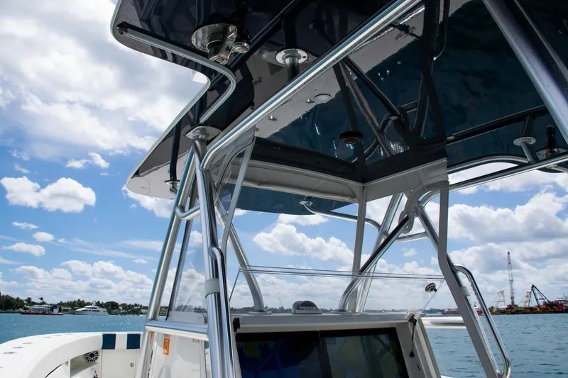 Slide: The Image of 2022 SeaVee 390Z boat with sleek design, under a clear blue sky. - 23