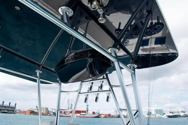 Slide: The Image of 2022 SeaVee 390Z boat with sleek T-top and sturdy metal framework. - 27