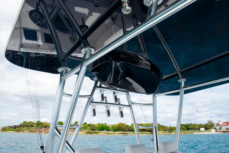 Slide: The Image of T-top structure of 2022 SeaVee 390Z boat with ocean backdrop. - 28