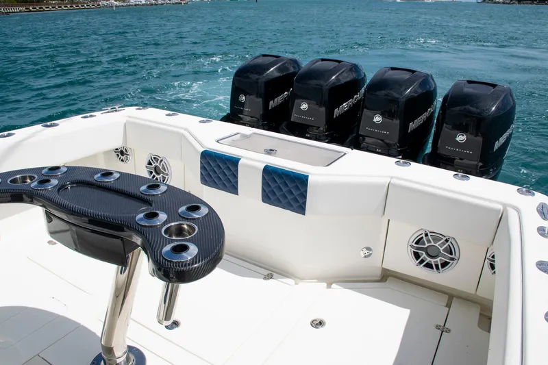 Slide: The Image of 2022 SeaVee 390Z boat with multiple Mercury outboard engines on blue water. - 31