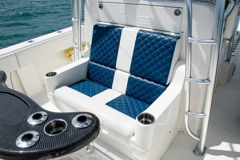Slide: The Image of Luxurious seating on 2022 SeaVee 390Z boat with quilted blue and white upholstery. - 36