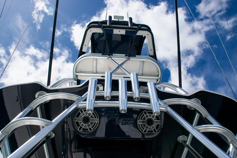 Slide: The Image of 2022 SeaVee 390Z boat with stainless steel features against a blue sky. - 37