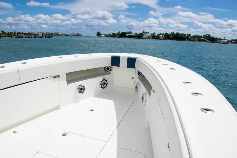 Slide: The Image of 2022 SeaVee 390Z boat deck with ocean view and clear blue sky. - 8