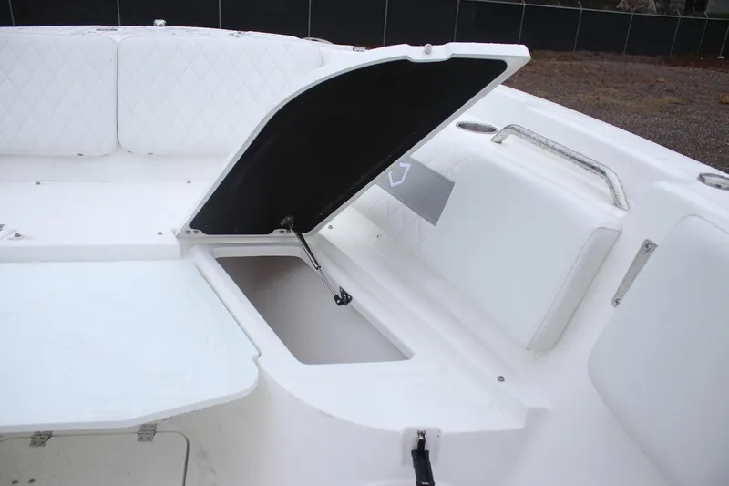 Slide: The Image of 2026 Sea Fox 268 Commander boat interior with open storage compartment. - 3