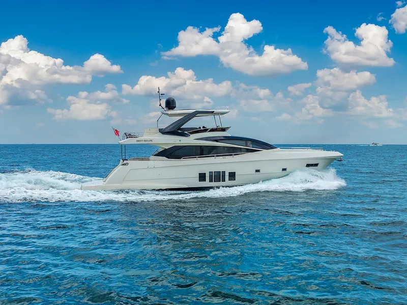 Slide: The Image of Luxury 2013 Astondoa 72 GLX yacht cruising on open sea under blue sky. - 16