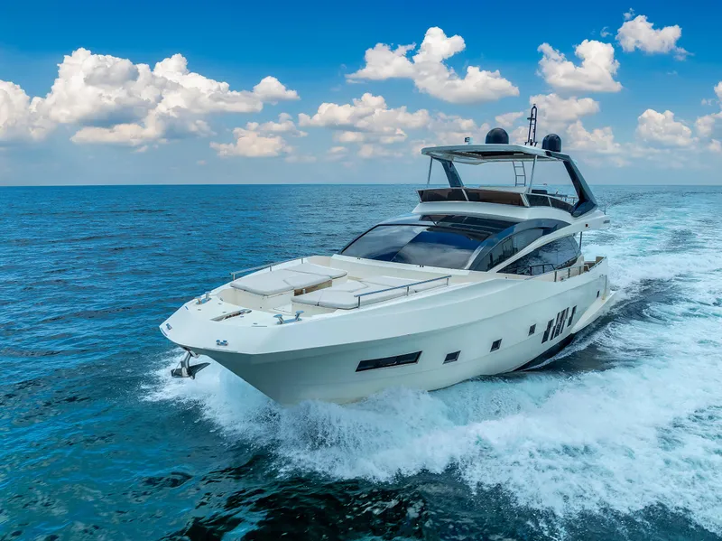Slide: The Image of Astondoa 72 GLX 2013 yacht cruising on open sea under blue sky. - 18