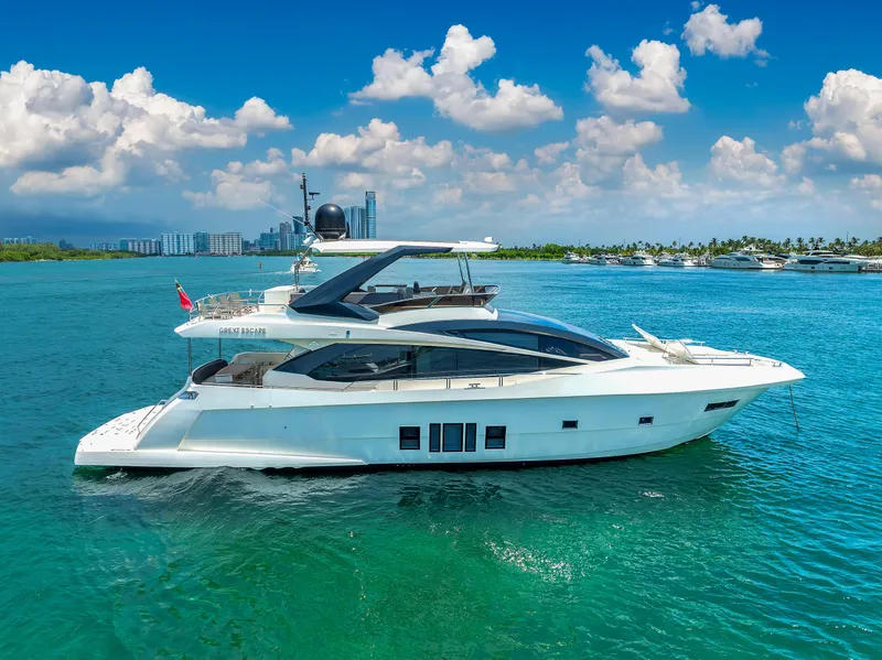 Slide: The Image of Astondoa 72 GLX 2013 yacht cruising on clear blue water under a sunny sky. - 3