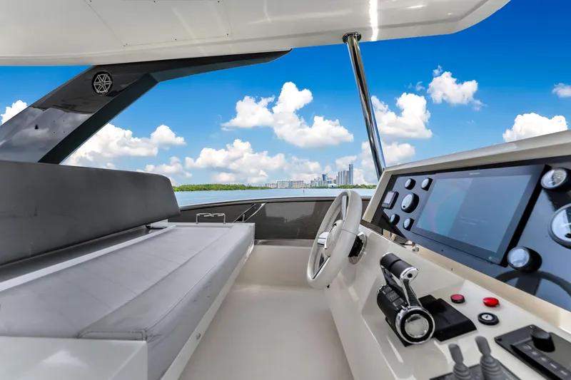 Slide: The Image of Astondoa 72 GLX 2013 yacht helm with modern controls and scenic ocean view. - 31