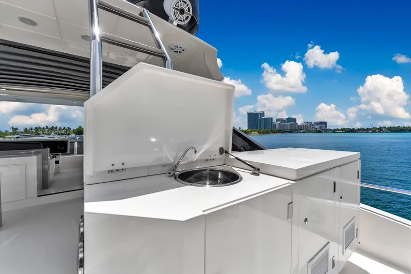 Slide: The Image of Luxurious 2013 Astondoa 72 GLX yacht with sleek outdoor kitchen and stunning waterfront view. - 35