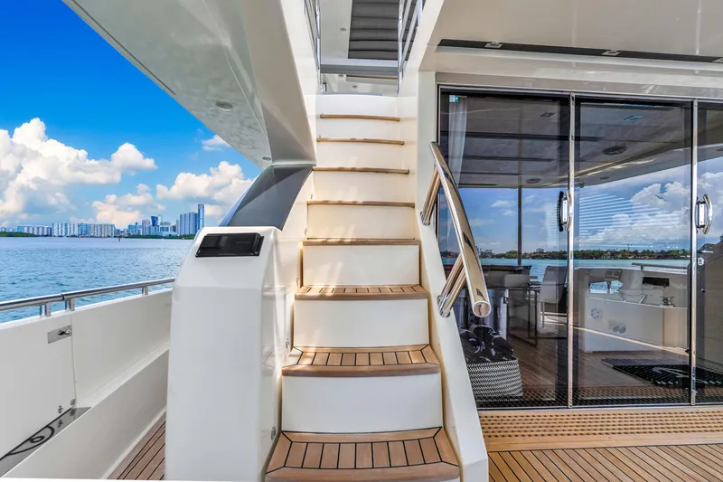 Slide: The Image of Astondoa 72 GLX 2013 yacht with wooden stairs and glass doors, ocean view. - 38