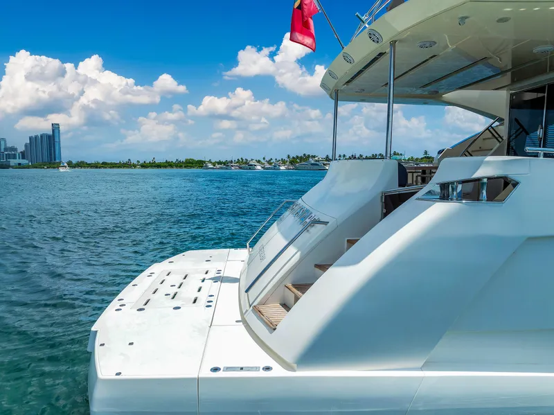 Slide: The Image of Astondoa 72 GLX yacht, 2013 model, docked on a sunny day with ocean view. - 4
