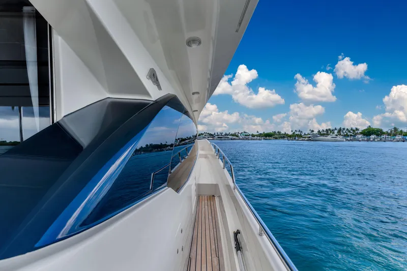 Slide: The Image of Astondoa 72 GLX yacht, 2013 model, cruising on a sunny day with blue skies and ocean. - 40