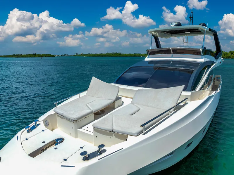 Slide: The Image of 2013 Astondoa 72 GLX yacht on serene blue water under a clear sky. - 7
