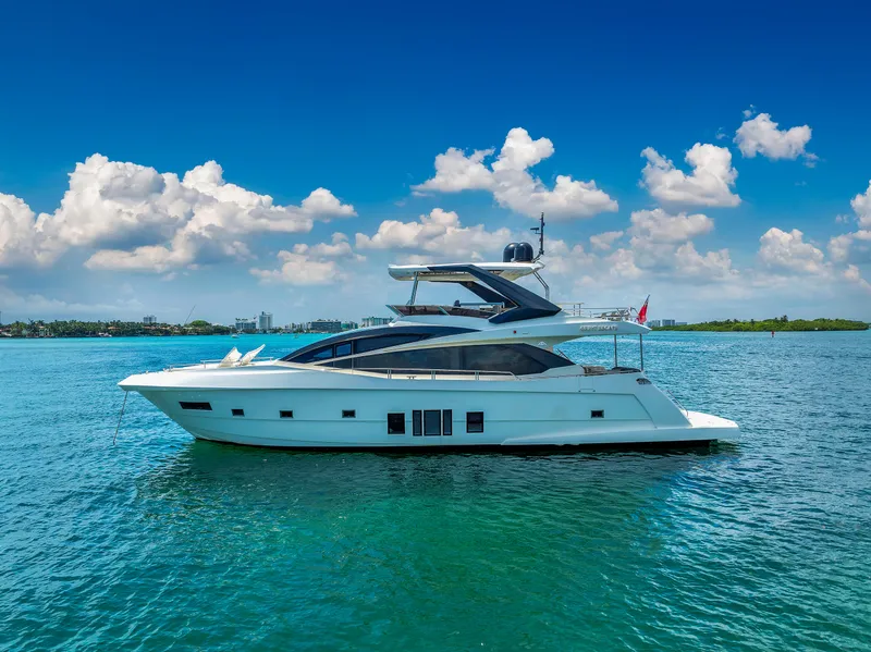 Slide: The Image of Luxury 2013 Astondoa 72 GLX yacht cruising on clear blue waters under a sunny sky. - 8