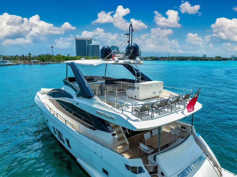 Slide: The Image of Luxurious 2013 Astondoa 72 GLX yacht cruising in clear blue waters. - 9