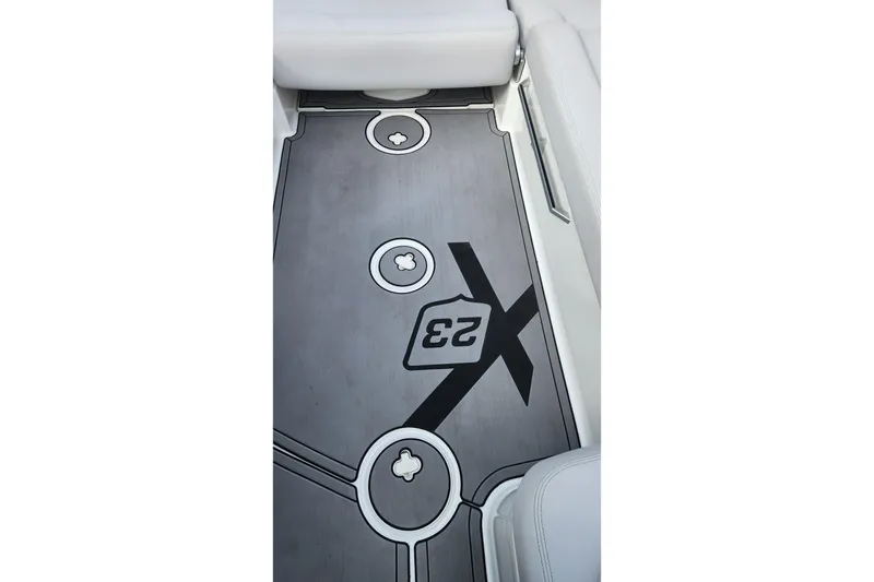 Slide: The Image of 2017 MasterCraft X23 boat interior with custom flooring design. - 11