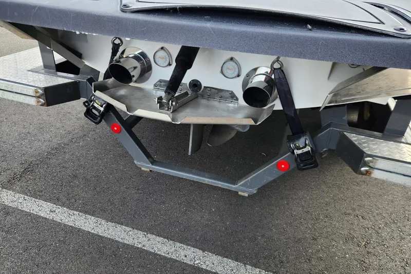 Slide: The Image of Rear view of a 2017 MasterCraft X23 boat on a trailer. - 25