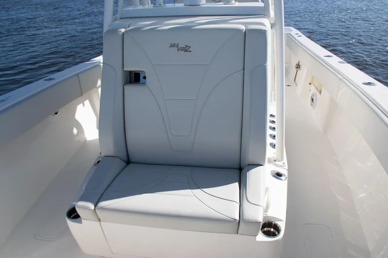 Slide: The Image of 2022 SeaVee 322Z boat with sleek seating and cup holders on deck. - 19