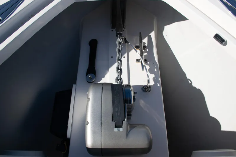 Slide: The Image of 2022 SeaVee 322Z anchor system with chain and winch in boat compartment. - 21