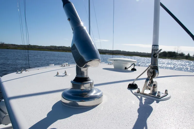 Slide: The Image of 2022 SeaVee 322Z boat deck with chrome fittings and water view. - 26