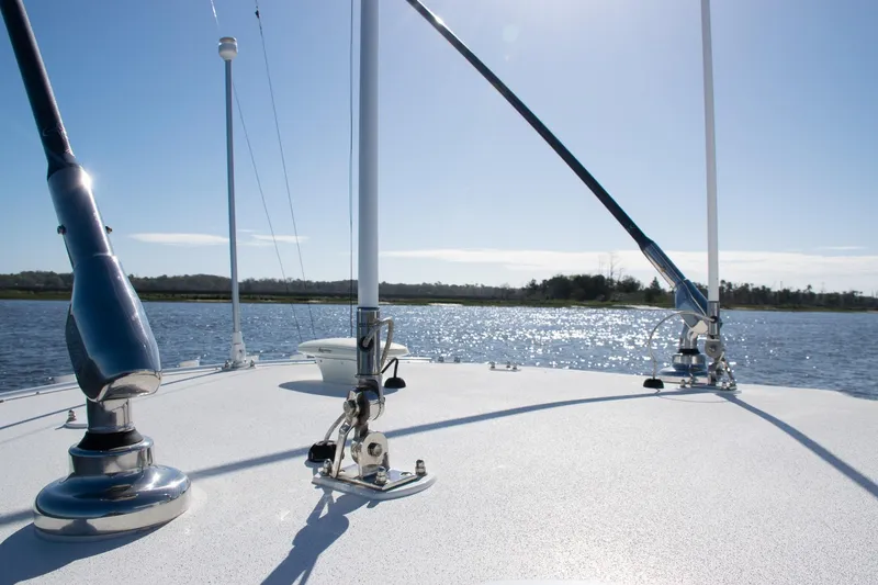 Slide: The Image of Bow view of 2022 SeaVee 322Z boat on a sunny day, with sparkling water. - 29
