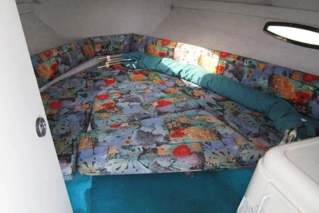 Slide: The Image of Interior cabin of 1995 Wellcraft 236 Eclipse boat with colorful upholstery. - 15