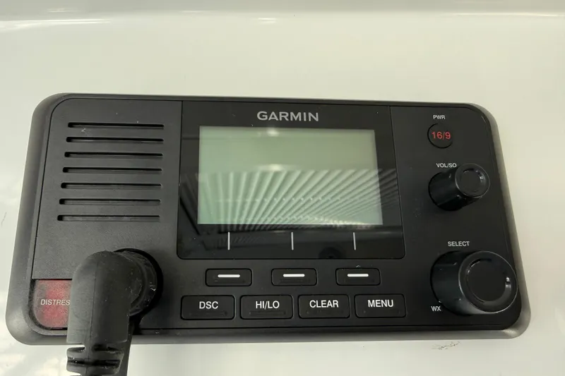 Slide: The Image of Garmin marine radio on 2020 Jeanneau NC 1095 boat dashboard. - 14