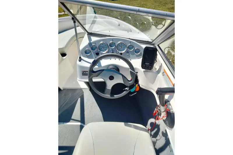 Slide: The Image of 2007 Bayliner 175 Bowrider dashboard with steering wheel and instrument panel. - 10