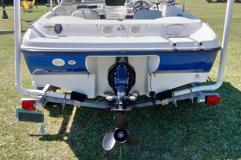 Slide: The Image of 2007 Bayliner 175 Bowrider on trailer, rear view showing outboard motor and propeller. - 5