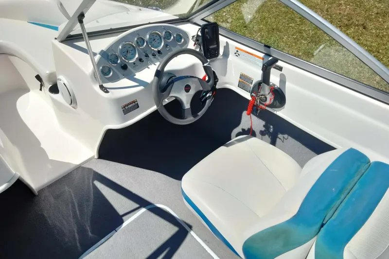 Slide: The Image of 2007 Bayliner 175 Bowrider cockpit with steering wheel and instrument panel. - 9