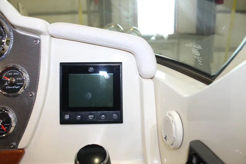 Slide: The Image of Dashboard of a 2018 Chris-Craft Launch 34 boat with gauges and display. - 30