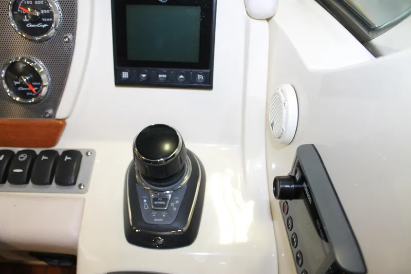 Slide: The Image of 2018 Chris-Craft Launch 34 dashboard with controls and gauges. - 31